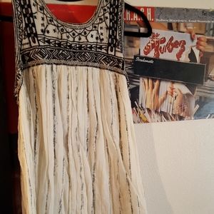 3/10$ Embroidered boho baby doll dress